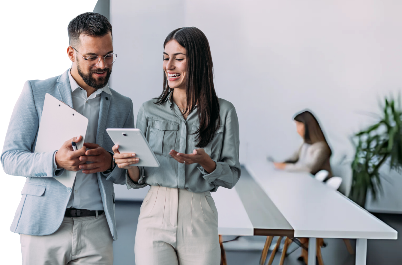 Man and woman looking at tablet