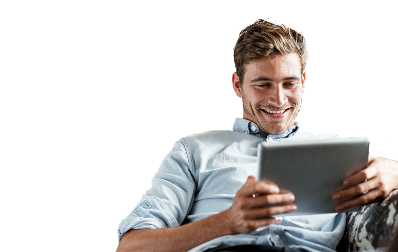 Man on his couch with tablet